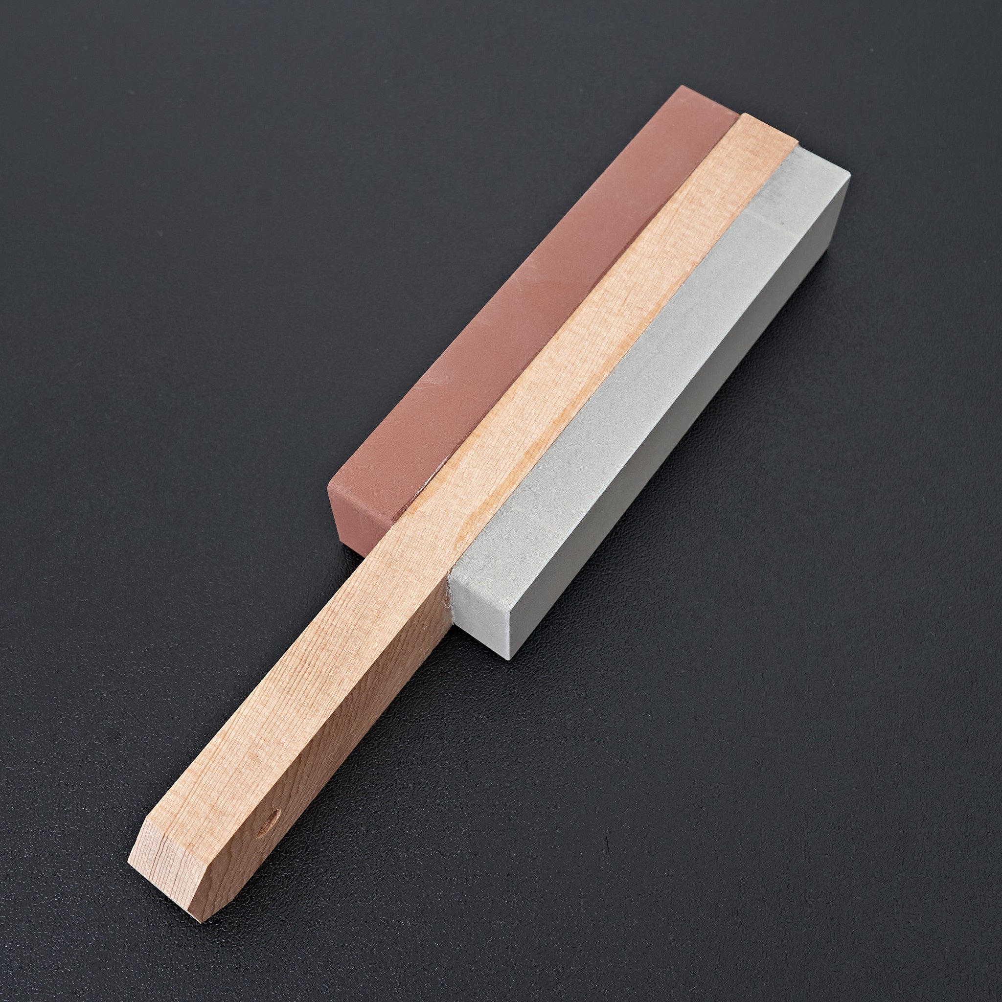 Hand held shop sharpening stone