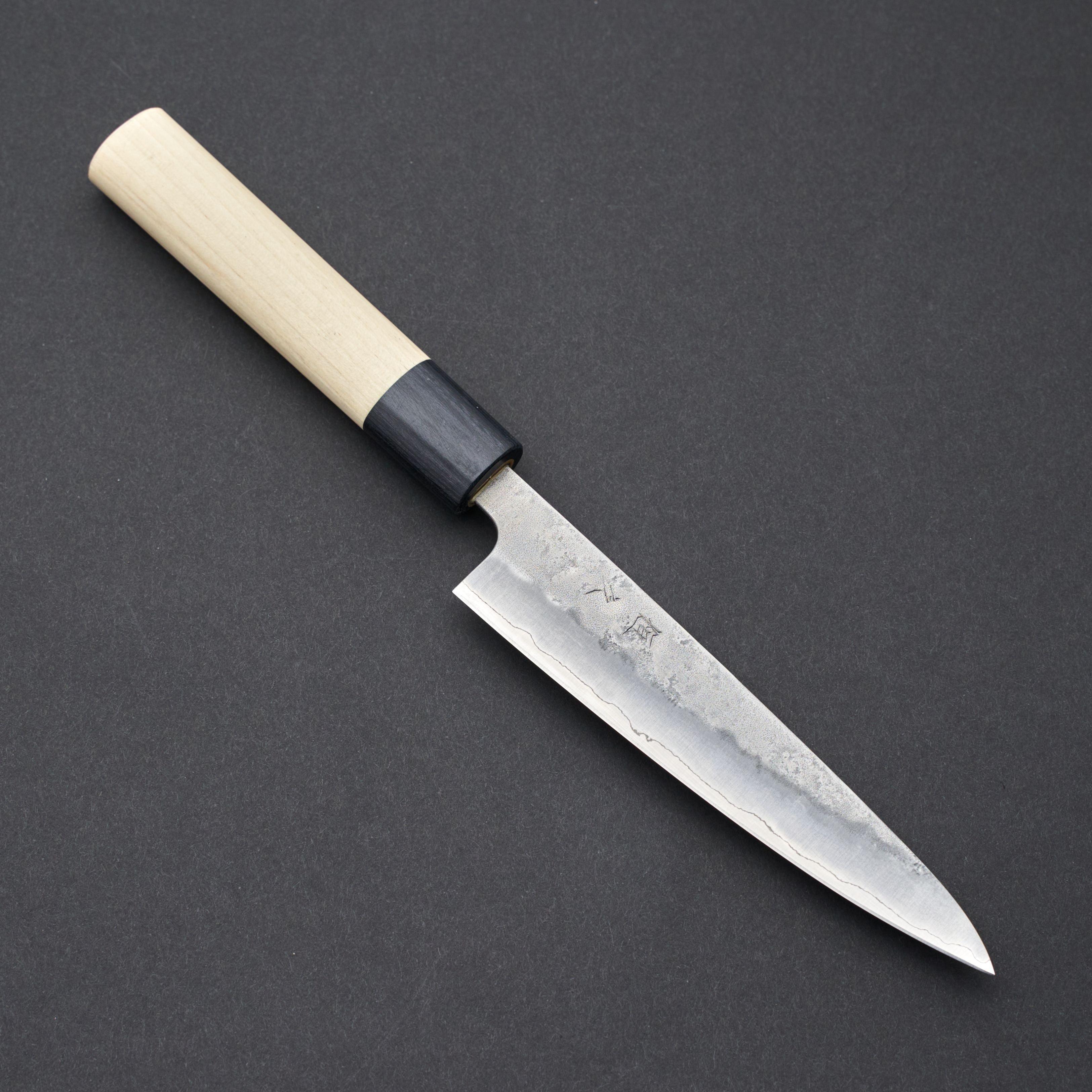 http://carbonknifeco.com/cdn/shop/files/Tsunehisa-Ginsan-Nashiji-Petty-135mm-Knife-Tsunehisa-chef-culinary-japanese-knife-knives.jpg?v=1704239307