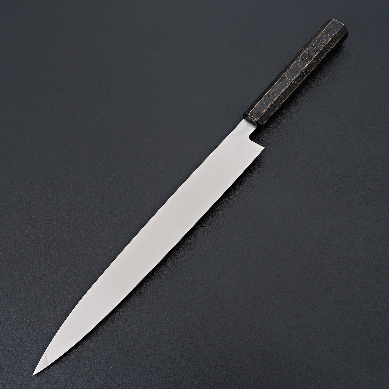 https://carbonknifeco.com/cdn/shop/files/Sakai-Takayuki-Nanairo-Black-Gold-Ink-Yanagiba-270mm-Knife-2.jpg?v=1704640931&width=1280